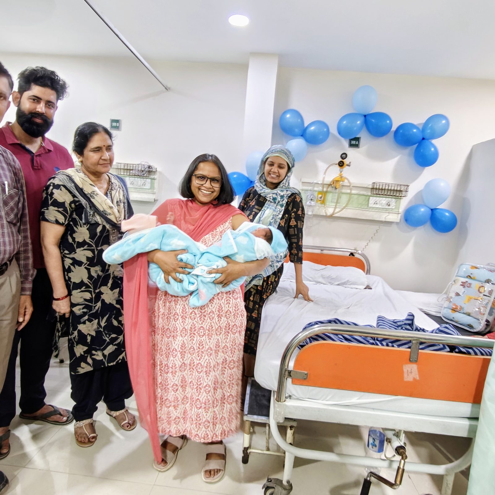Family with twins at Dr. Anam Ghani clinic
